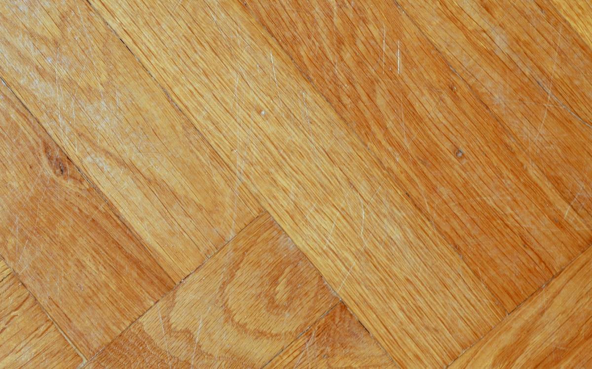 Compatibility chart showing where Roberts Protect All 2057 adhesive works: approved for vinyl sheet, LVT, rubber; not for wood, ceramic, or carpet