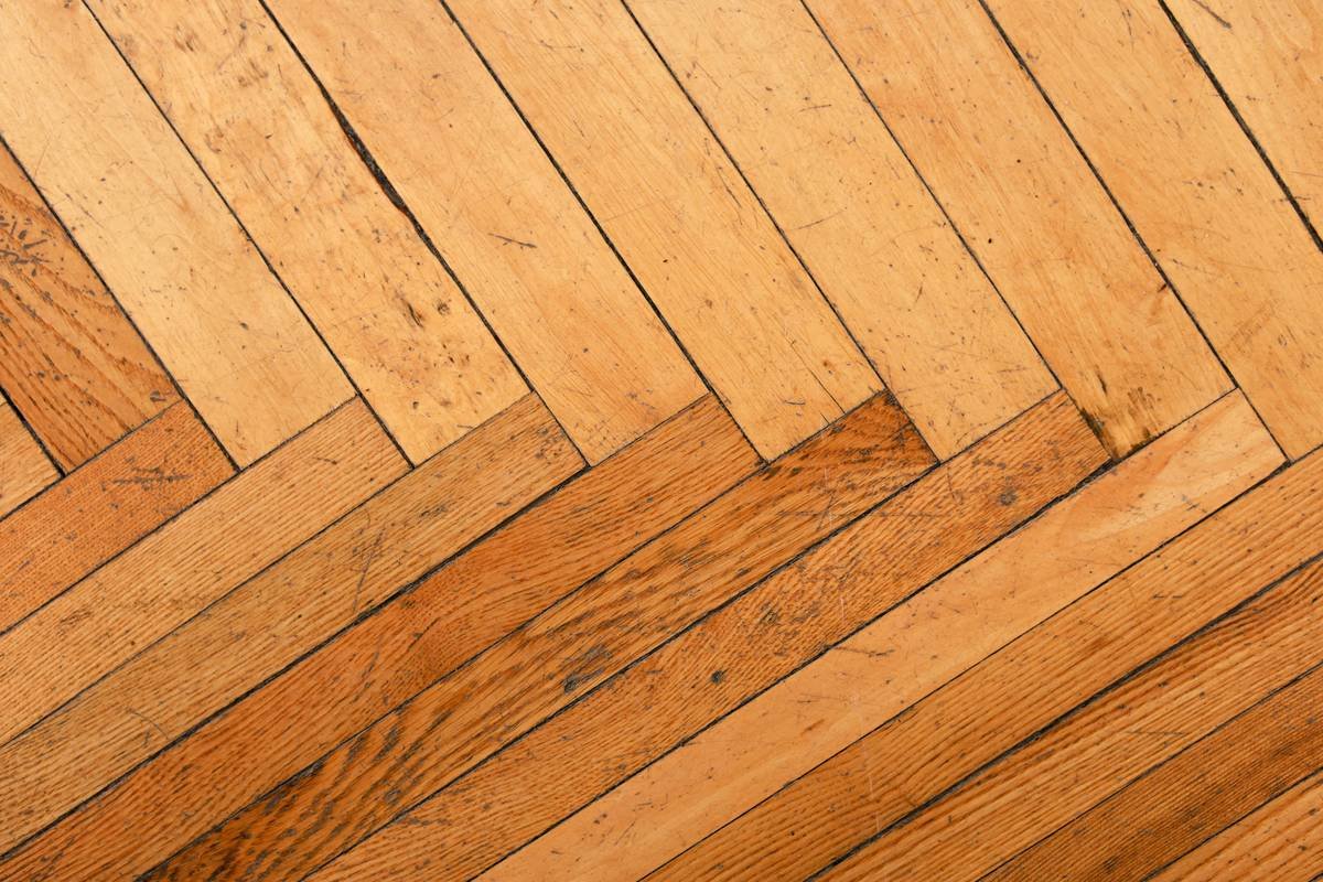 adhesive flooring solutions snap installation process showing snapped planks on subfloor